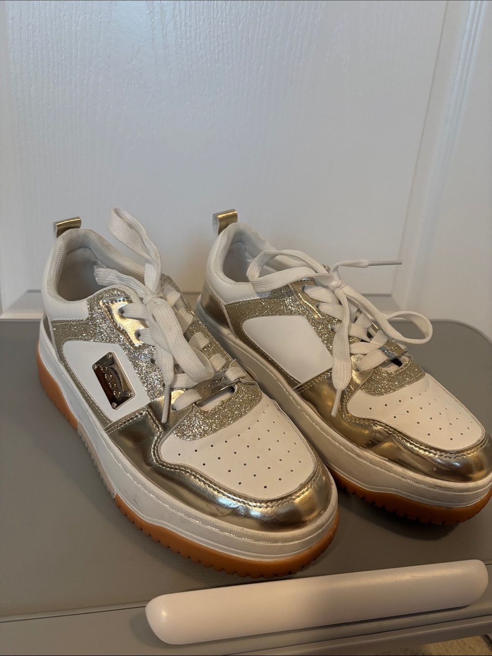 bebe White and Metallic Gold Platform Sneakers